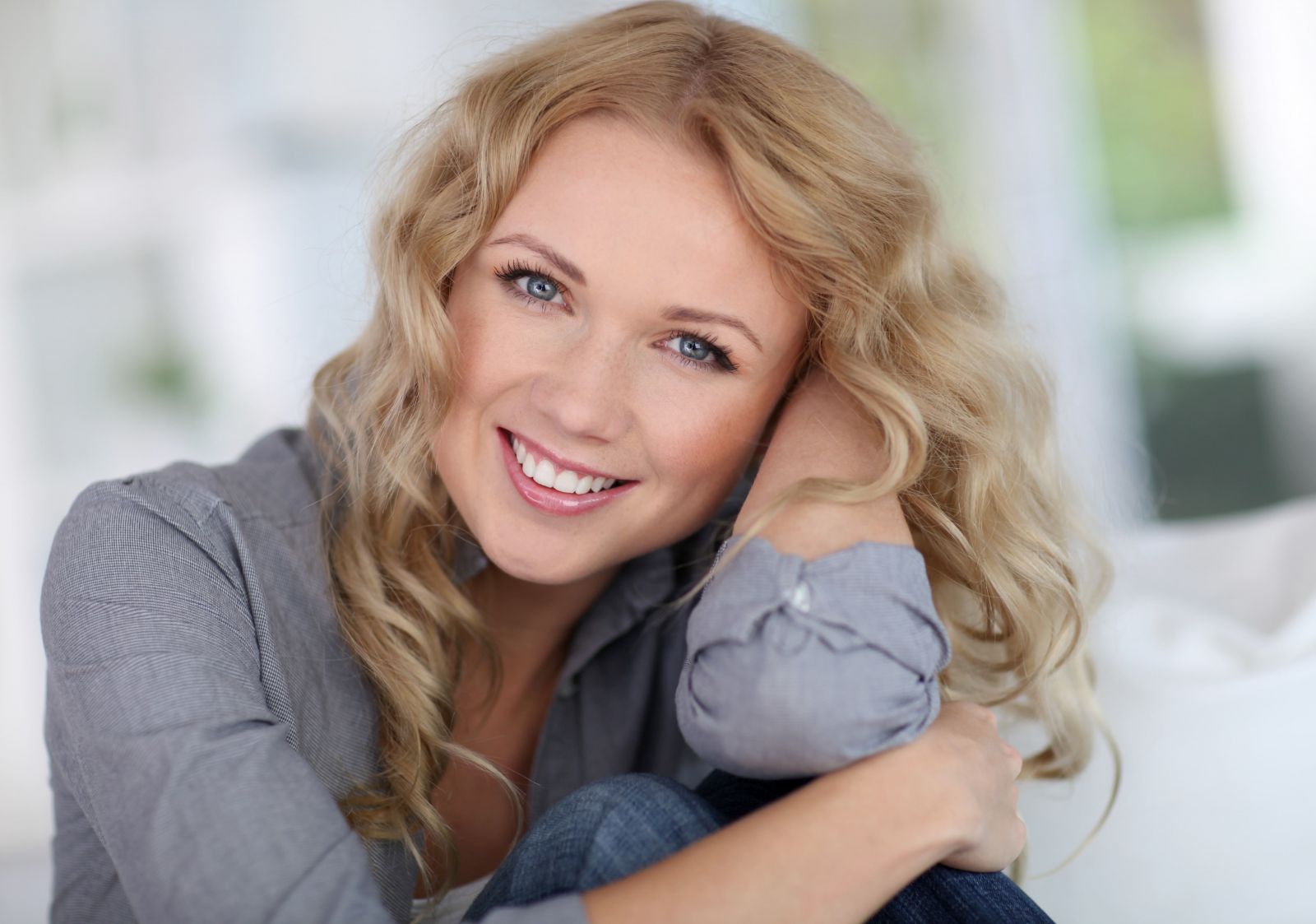 blond woman smiling with beautiful teeth, cosmetic dentistry Charlottesville, VA